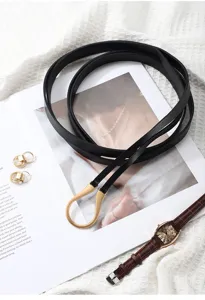 Close-up detail showcasing the sleek black thin leather belt with a gold buckle.