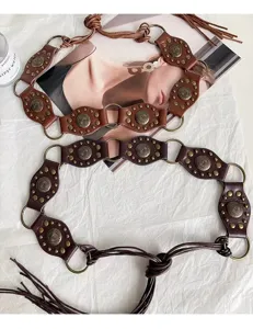 Boho retro waist belt with metal studs and rings, perfect punk style accessory for dresses.