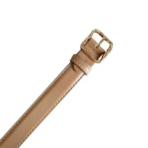 Elegant women's leather belt with chic wavy square buckle, ideal for casual wear and suits.