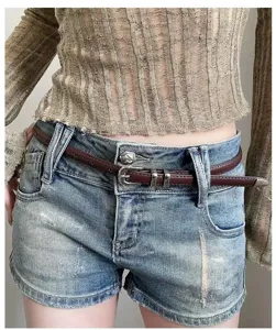 Stylish thin leather belt for women, retro waist accessory for denim shorts and summer dresses.