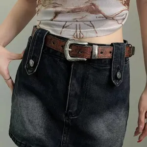 Ethnic retro style leather belt for women, vintage floral carved buckle waist accessory.
