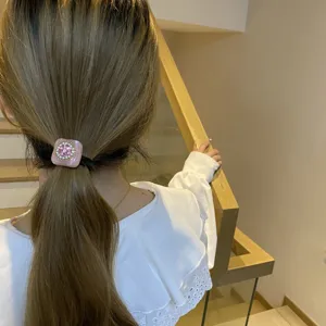 Elegante elastico per capelli quadrato rosa con strass, fermacoda di cristallo per stile chic.