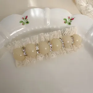 Sweet white lace hair clip with beige pearls and rhinestones, elegant side clip for women.