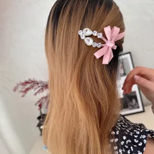 Sweet rhinestone bow hair clip side clip sweet girl hair accessory for women styling.