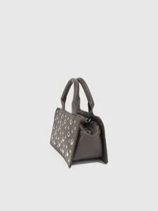 Dark grey studded handbag detail, punk style top handle shoulder bag with metal rivet accents.