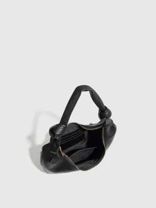 Stylish black leather underarm shoulder bag featuring a chic knot handle and secure zipper.