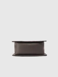 Dark brown leather handbag bottom detail shot, minimalist design for women's daily commute.