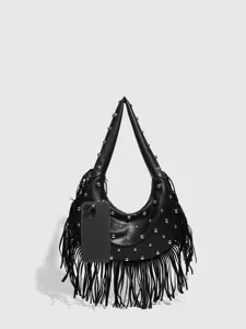 Detail view of a black fringe shoulder bag with gold-tone studs and soft leather texture.