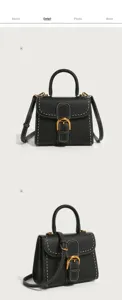 Black leather top handle bag with iconic horseshoe metallic buckle and white contrast stitching detail.