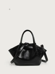 Black pleated shoulder bag detail, elegant shiny finish and structured bucket shape design.
