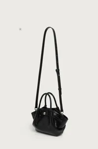 Black leather pleated shoulder bag with top handle and strap, chic commuter handbag detail view.