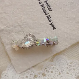 Exquisite rhinestone side hair clip with sparkling crystals for elegant daily styling.