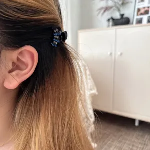 Elegant rhinestone hair claw clip for women, sparkling blue crystal small side hair accessory.