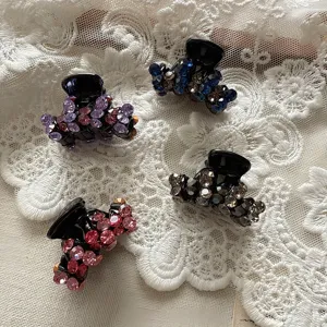 Small rhinestone hair claws set, sparkling crystal hair clips for elegant half-up hairstyles.