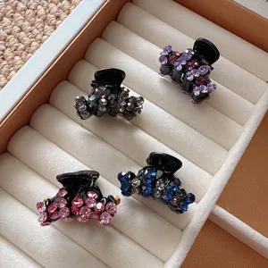 Mini rhinestone hair claw clips set, sparkling crystal hair catch for elegant half up hairstyles.