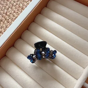 Blue rhinestone small hair claw clip for women, sparkling crystal hair accessory for half up do.
