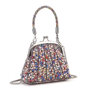 Elegant pearl and crystal embellished kiss-lock evening bag for women party handbag.