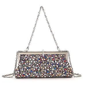 Detailed view of an elegant evening clutch bag with colorful pearls and sparkling rhinestones.
