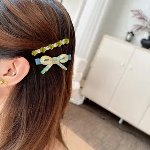 Chic Korean style hair clips set featuring a cute bow and green beaded design for daily wear.