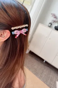 Korean sweet hairpin set with sparkling rhinestones and cute pink bows for daily charming hairstyles.