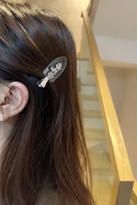 Cute rhinestone flower hair clip, elegant acetate duckbill clip for women and girls daily wear.