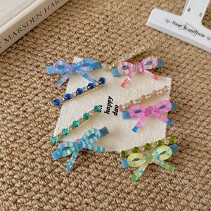Colorful resin bow hair clips set, sparkling crystal side clips for cute Korean fashion styling.