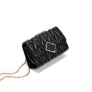 Black quilted shoulder bag for women, chic chain crossbody bag with stylish geometric clasp.