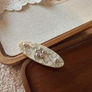 Elegant acetate oval hair clip with silver flower beads, chic retro daily hair accessory.