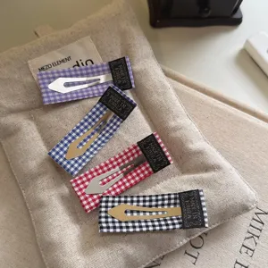 Korean retro plaid fabric BB hair clips set, cute minimalist side clips for daily hair styling.
