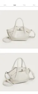 Detail view of the elegant off-white pleated bucket bag showing handle and hardware details.