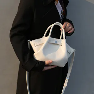 White pleated handbag for women, chic shoulder crossbody bag with top handles, trendy design.