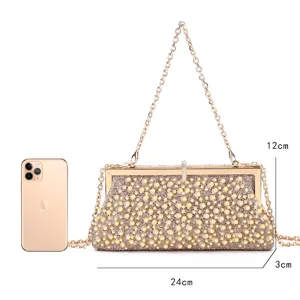 Elegant pearl embellished glitter evening clutch bag with metal chain strap for women.