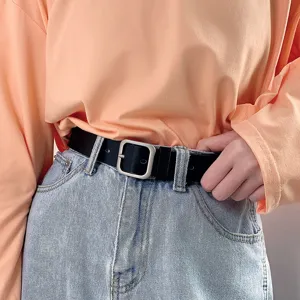 Minimalist black leather belt for women featuring a stylish silver square pin buckle design.