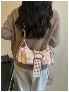 Vintage roze PU lederen schoudertas met meerdere zakken en geniete gesp voor vrouwen.