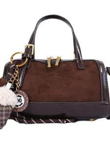 Vintage brown suede Boston handbag for women, stylish contrast top-handle shoulder bag.
