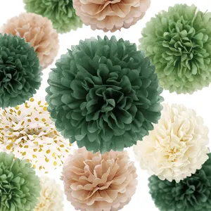 Detail view of colorful paper pom poms set in green, beige and gold dot for party decor.