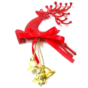 Christmas beaded reindeer hanging ornament with red ribbon bow and golden bells for tree decor.