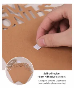Detail shot of baby monthly photo banner showing adhesive foam dots for easy photo mounting.