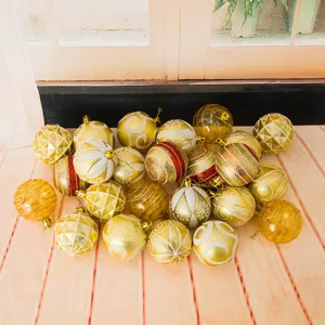 Assorted 6cm Christmas baubles set with gold and white painted patterns for festive tree decor.