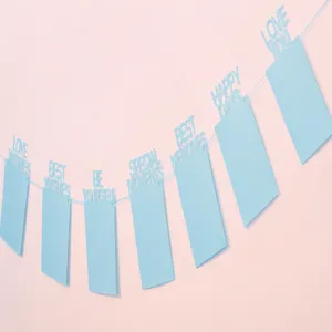 Detailed shot of blue 12 months baby photo banner, perfect for first birthday party decor.
