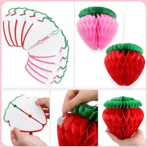 Strawberry honeycomb paper balls for birthday party hanging decorations and fruit paper crafts.