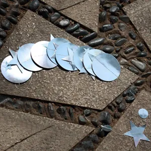 Silver star and circle paper garland for party decoration, festive hanging string decor.
