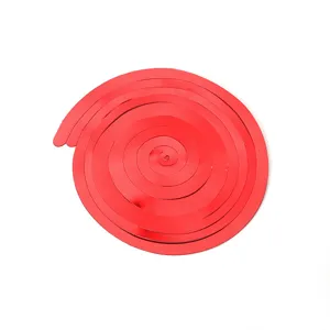 Red spiral hanging decoration detail view, party background wall ornament, festive 3D streamer pendant.