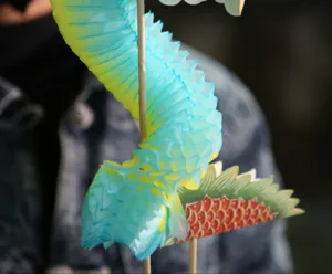Colorful paper dancing dragon toy honeycomb folding dragon for New Year festive party decor.