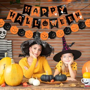 Halloween party decoration set with Happy Halloween banner, pumpkin garlands, and festive props.