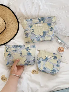 Embossed floral makeup bag set, portable travel zipper storage pouch for women daily use.