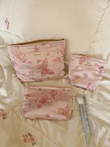 Cute butterfly cosmetic bag set, portable travel makeup pouch, canvas storage organizer for daily use.
