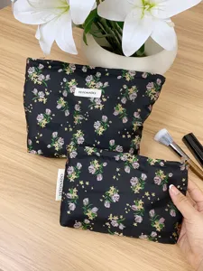 Floral print cosmetic bag set, portable zipper makeup pouch for travel and daily use.