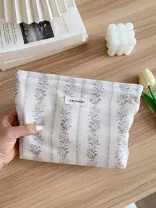 Vintage floral cosmetic bag, large capacity canvas makeup pouch, chic aesthetic portable storage bag.