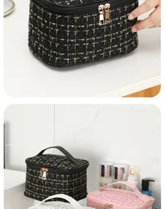 Detail view of portable tweed cosmetic bag, showcasing chic black texture and golden zippers.
